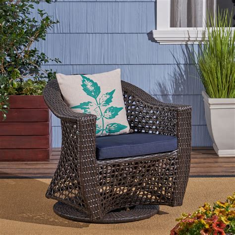 Zayn Outdoor Swivel Wicker Chair With Cushion Multi Brown Navy Blue