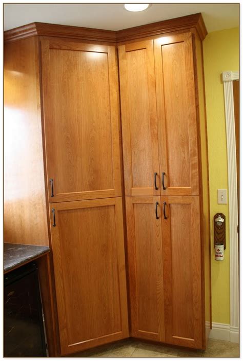 Enjoy free shipping & browse our great selection of kitchen storage standing 63'' tall, its frame is constructed from wood with no resistant finishing, so it should not be used in damp environments. Free Standing Corner Pantry Cabinet
