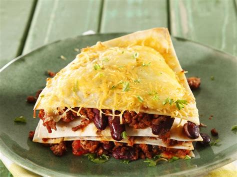 This link is to an external site that may or may not meet accessibility guidelines. Mince tortilla stack | Beef recipes, South african recipes ...