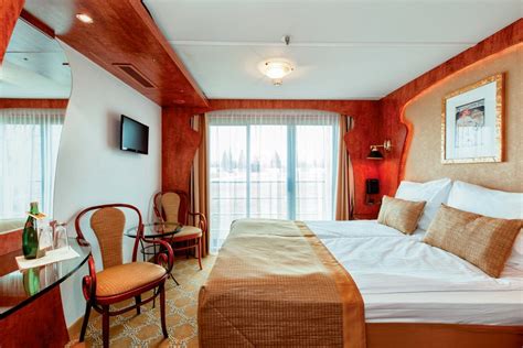 Cabins on the romeo (lower) deck are slightly smaller at 14 square metres (151 square feet), but feature the same amenities apart from one armchair and table and have smaller, fixed windows. MS Swiss Corona Review - Burgundy & Provence