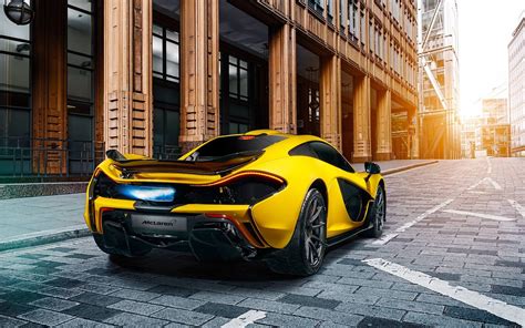 Mclaren P1 Yellow Supercar Rear View City Wallpaper Cars Wallpaper