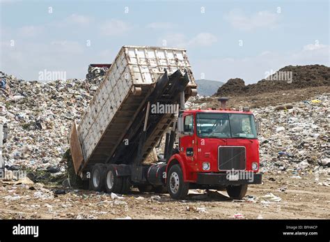 Truck Dumping Waste At Landfill Site Stock Photo Alamy
