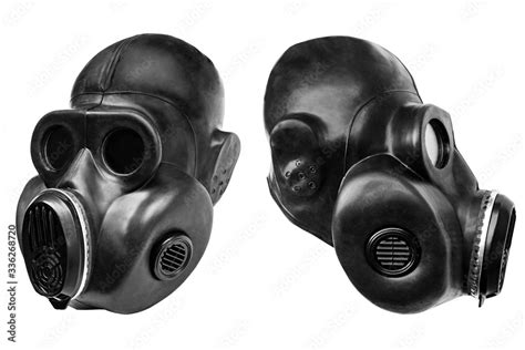 Black Rubber Gas Mask With Integrated Filters In Two Angles On A White