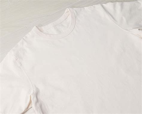 Premium Photo Blank Beige T Shirt Mockup Template On The Floor