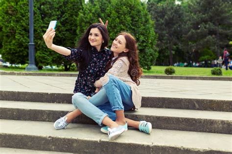 Two Girls Making Funny Selfie On The Street Having Fun Together Stock Image Image Of Stairs