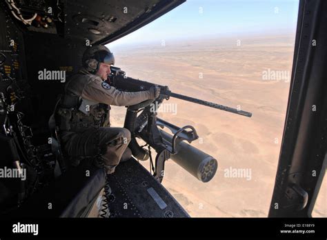 Us Marine Cp David Smith A Helicopter Door Gunner Aims At A Target