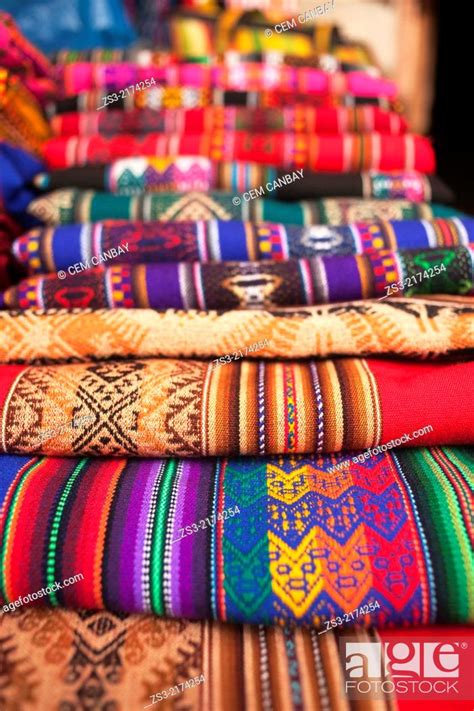 Close Up Shot Of Blankets And Bags At The Open Air Market In Pisaq