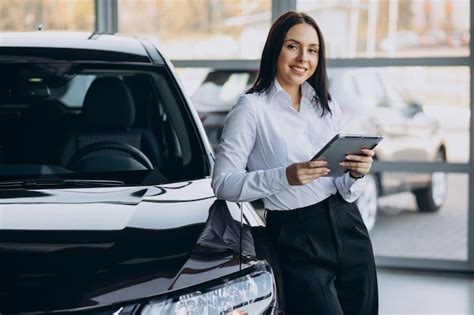 Free Photo Woman Buying New Car In Car Showroom