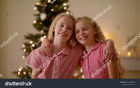 Close Portrait Two Twin Sisters Hugging Stock Photo 1845088384