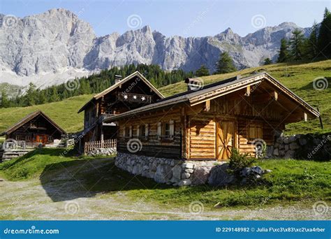 Traditional Rustic Wooden Cabins In Neustatt Valley In Austrian Alps Of