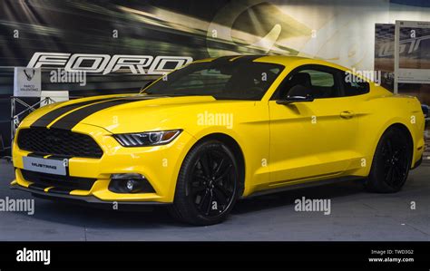 A Yellow Ford Mustang Gt 2019 Edition Of Parco Valentino Car Show