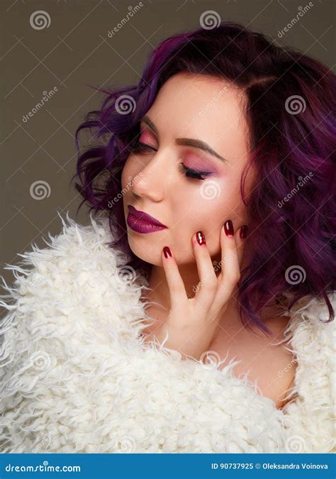 Portrait Of Young Beautiful Woman With Violet Make Up And Purple Stock