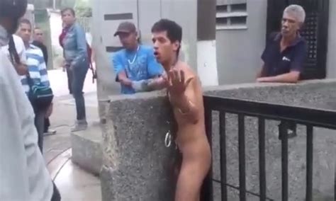 thief stripped latino thief in public