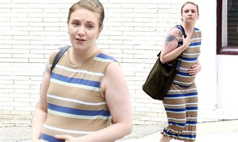 Lena Dunham Accentuates Her Fake Baby Bump In Stripes As She Cradles Stomach On New York Set Of