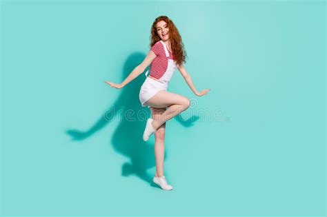 Full Length Body Size View Of Lovely Cute Cheerful Girl Dancing Posing