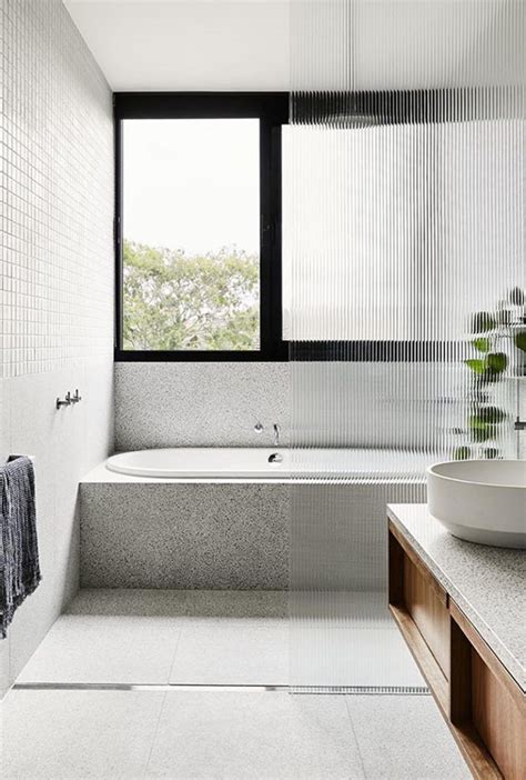 This Modern Bathroom Is Filled With Terrazzo Tiles And Countertop