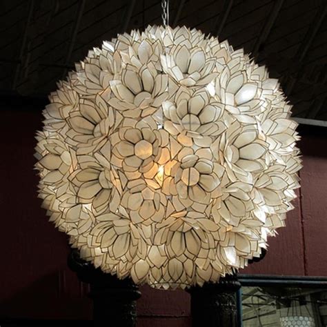 Nothing says summertime like shells, and this (faux) capiz shell chandelier is so summery and fresh. Capiz Shell Lotus Hanging Chandelier | Chairish