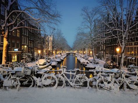 Snow Has Fallen Down In The Centre Of Amsterdam © All
