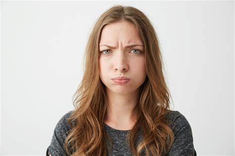 Free Photo Portrait Of Young Pretty Offended Girl With Funny Face