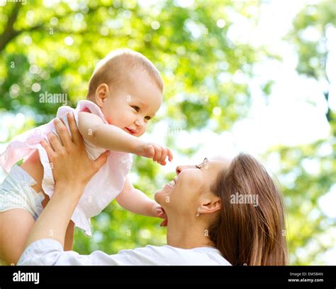 Beautiful Mother And Baby Outdoors Nature Stock Photo Alamy