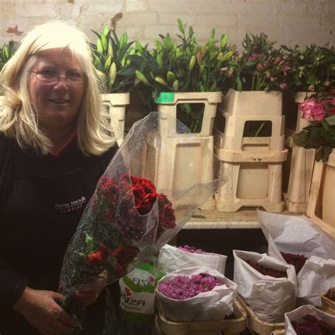 jill unpacking roses ready for valentine s day orders flower delivery florist flowers