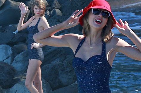 Taylor Swift Keeps Her Belly Button Covered In 50s Swimwear As She