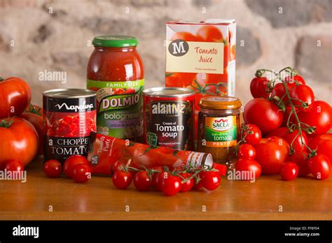 Tomatoes And Tomato Products On A Country Kitchen Table Including Soup