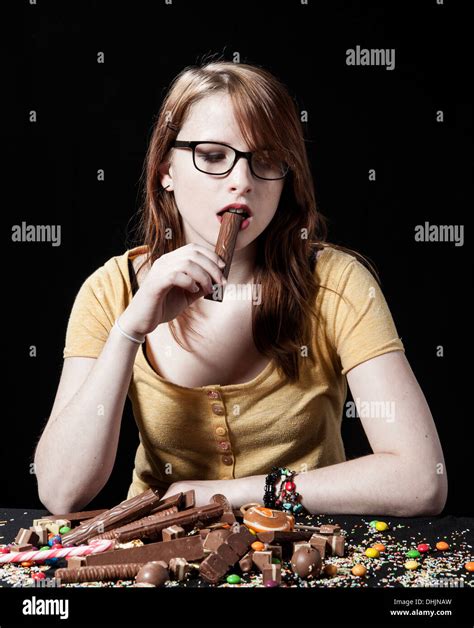Black Woman Eating Chocolate Bar Hi Res Stock Photography And Images