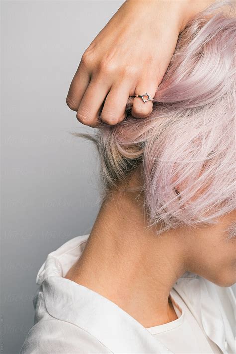 Close Up Of Unrecognizable Girl Holding Pink Hair By Stocksy Contributor Danil Nevsky Stocksy