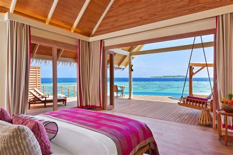 milaidhoo island debuts overwater bungalows in the maldives overwater bungalows luxury resort