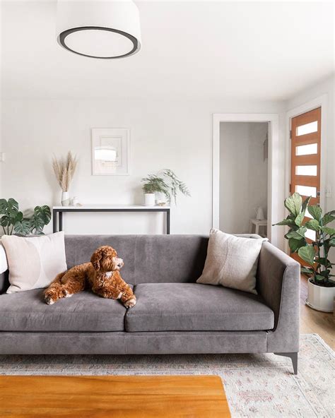 Minimalist living room with dark furniture 17 Minimalist Living Room Design Ideas | Extra Space Storage