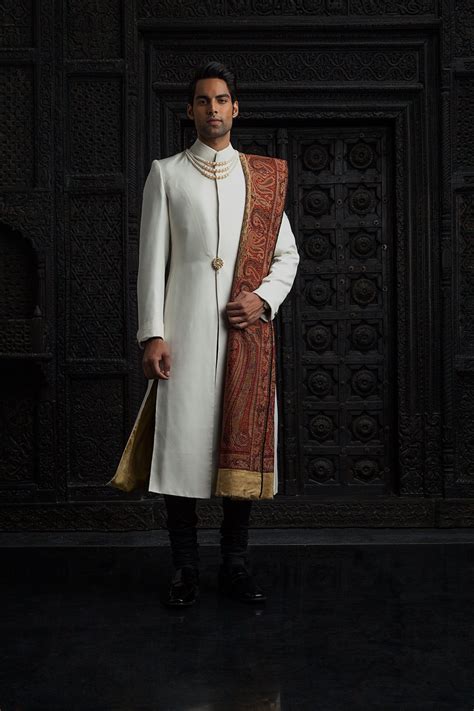 Indian wedding dresses for men & traditional indian suits for men are now available in stylish modern designs. Tarun Tahiliani sherwani for India Bridal Fashion Week ...