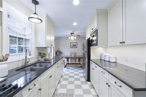 Black and white color patterns are simple yet elegant, whereas usage of. Modern White Galley Kitchen - Rhode Kitchen & Bath Design ...