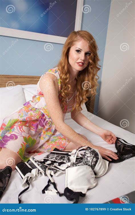 Woman Looks At A Set Of Lingerie Stock Image Image Of Sitting Lingerie 102767899