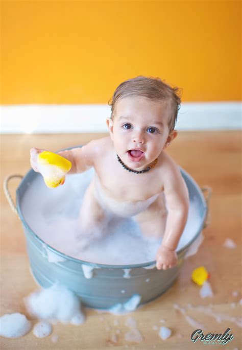 This item may be discontinued or not carried in your nearest store. baby in bath tub. www.gremlymedia.com | Bebe