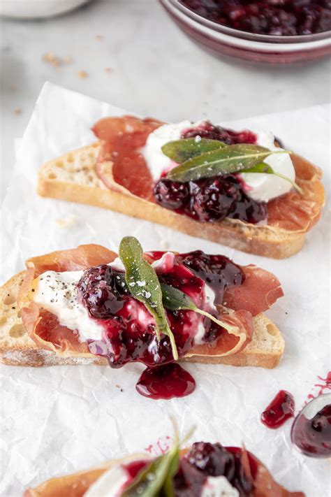 Burrata Crostini With Blackberries Prosciutto And Sage With Spice