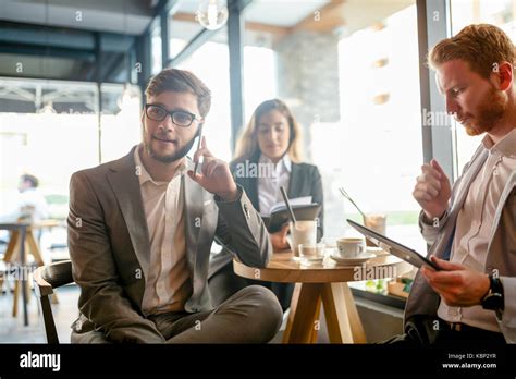 Business People Talking And Laughing Together Stock Photo Alamy