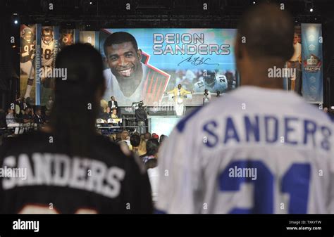Fans Watch As Deion Sanders Delivers His Induction Speech During The