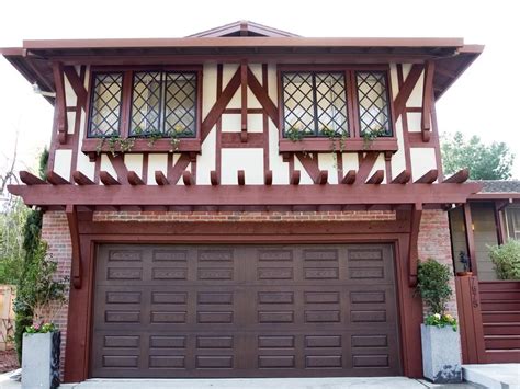 Tudor Style Home With Window Boxes And Wood Accents