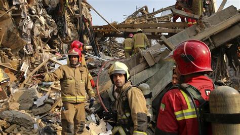 Iran Building Collapse Firefighters Killed As Fire Rages Au