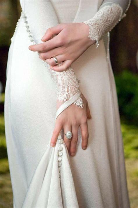 Laced in the front as well as the back a gown by chaviano couture. First Photos of Bella's Breaking Dawn Wedding Dress ...