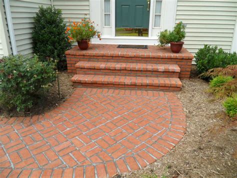 The most common red brick walkway material is cotton. Front Steps Design option. | Brick walkway, Brick pathway ...