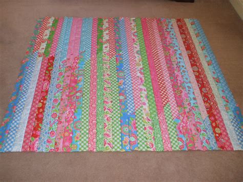 A Marathon Quilt Top Made From A Moda Jelly Roll Of 40 25 Strips