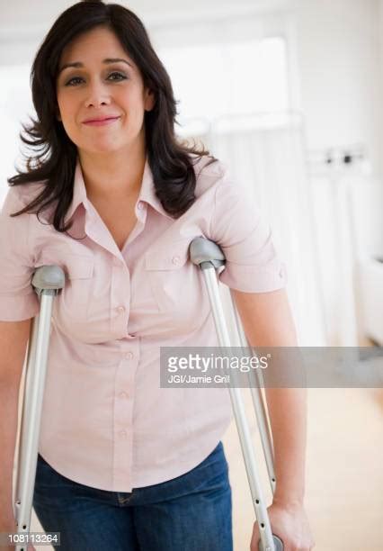 Mature Woman Crutches Photos And Premium High Res Pictures Getty Images