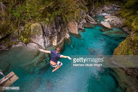 The Blue Pools Of Makarora Offer Enticing Blue Waters To Swim In A Man