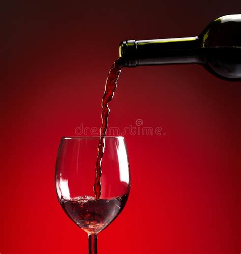 Red Wine Being Poured Into Wine Glass Stock Image Image Of Dinner