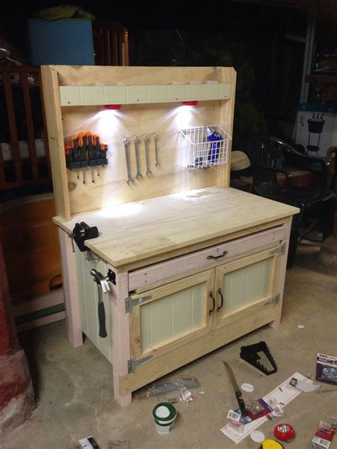 DIY kids work bench. I want of these in the new garage for the kids, so