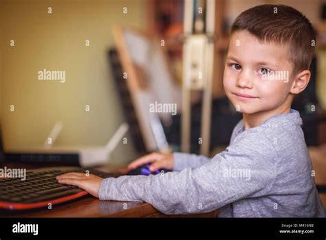 Young Boy Playing Games On A Desktop Computer Stock Photo Alamy