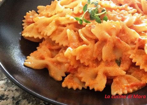 Pomodori pelati in scatola 250. Farfalle con polpa di granchio | La cucina di Mara