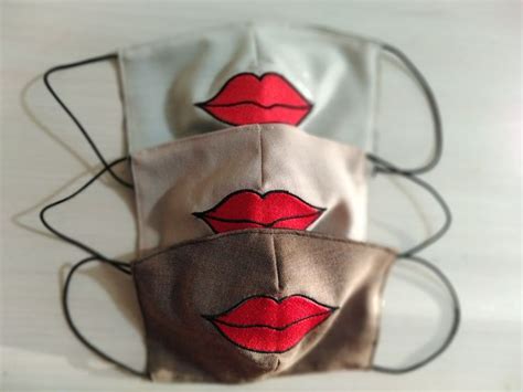 Maybe you would like to learn more about one of these? Three shades of our mask with Lips, Washable Embroidered ...